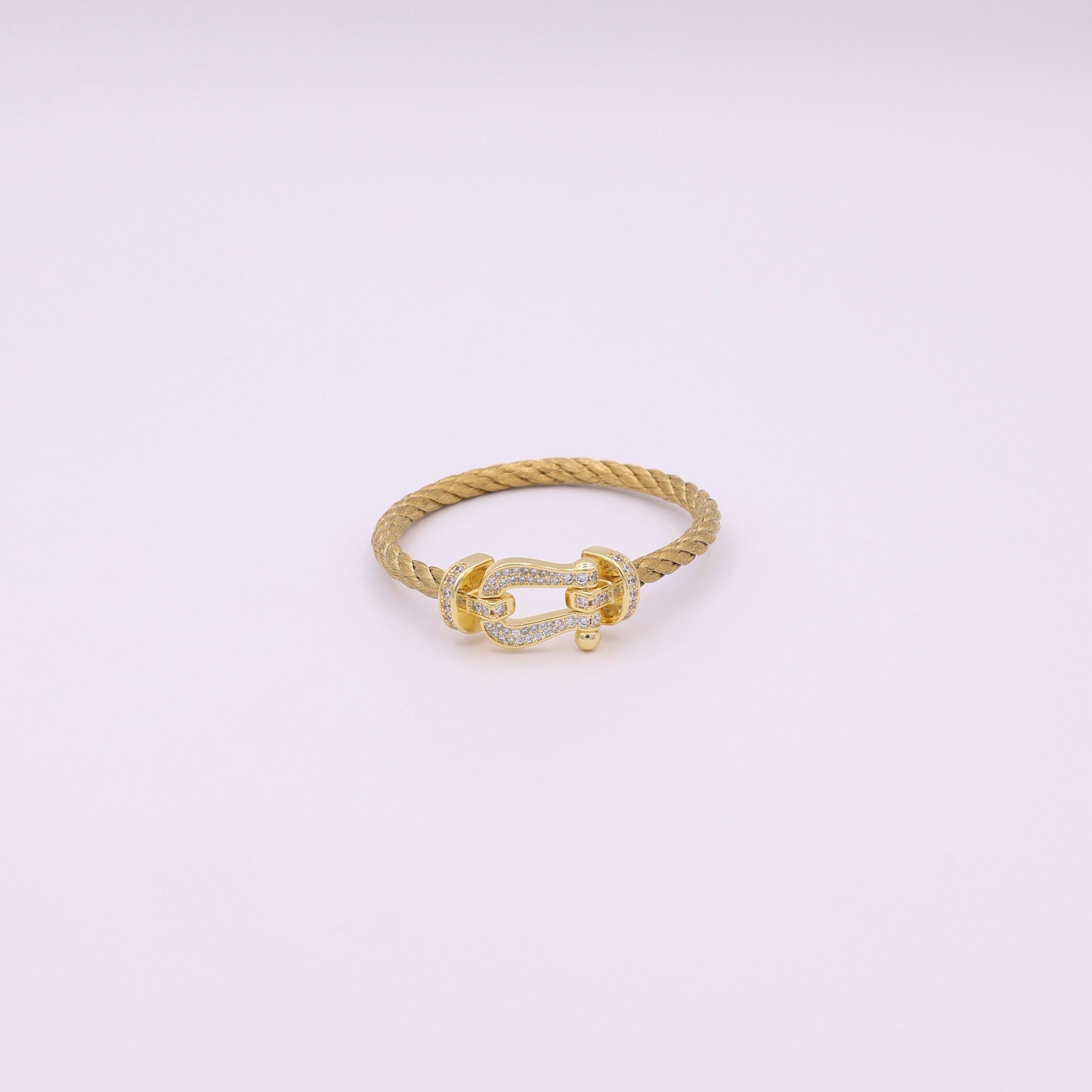 GEDRAAIDE RING – 18K GOUD
