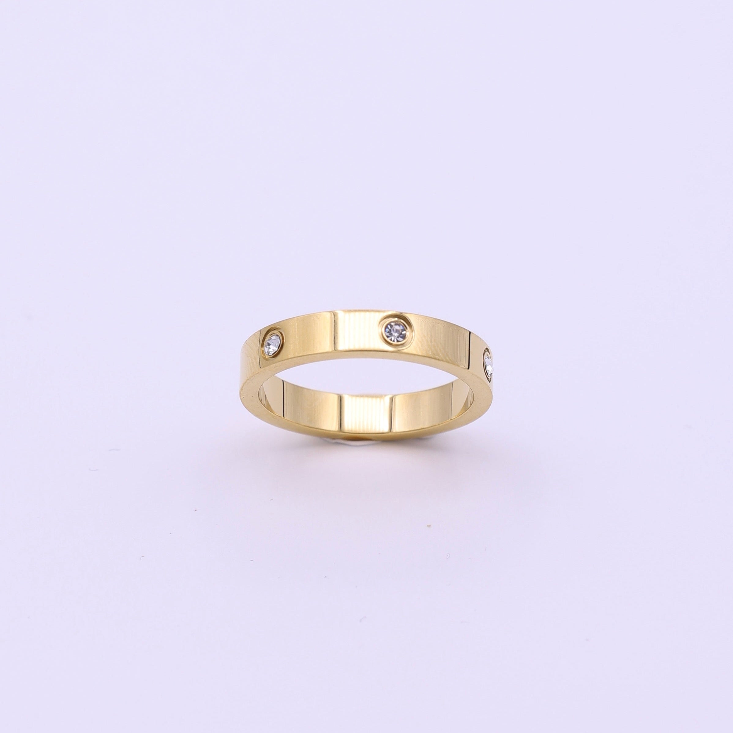 GEDRAAIDE RING – 18K GOUD
