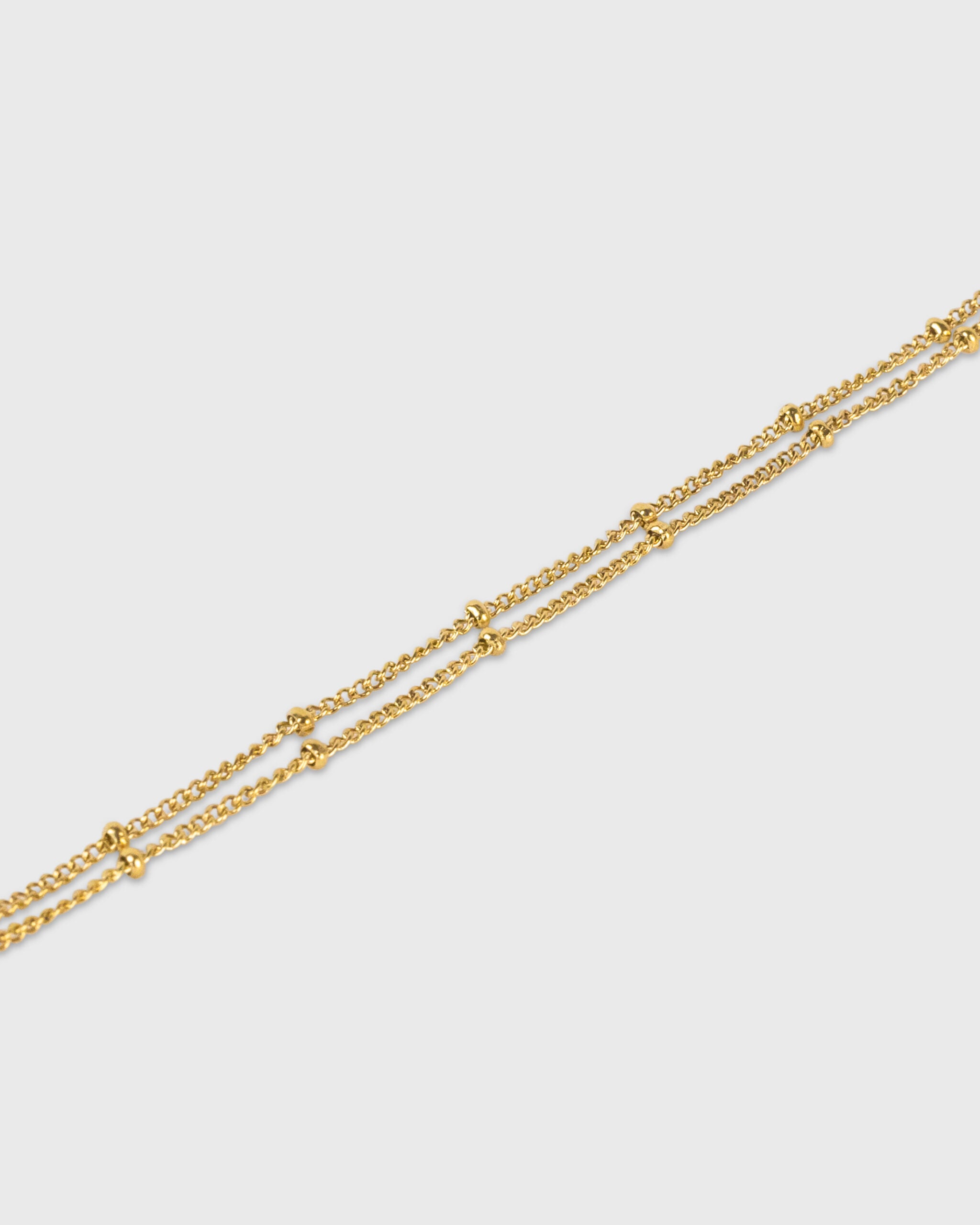 DUBBELE ARMBAND – 14K GOUD